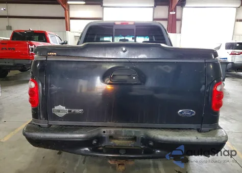 2001 Ford F150 Supercrew z USA, uszkodzony, nr VIN 1FTRW07LX1KB77375